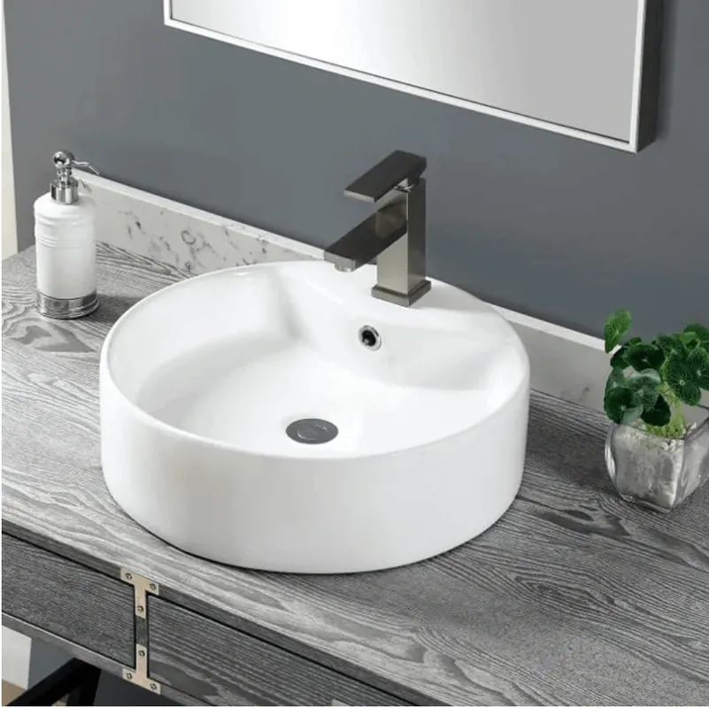 Acheter En Ligne Lavabo rond 584, porcelaine 18 3/8 x 15 x 6 5/8 po, blanc